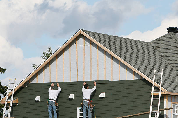 Professional Siding Replacement technician working in Boonville, IN